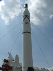 Foreground: Juno I, Background: Saturn IB