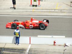 Michael Schumacher and his Ferrari F2005 going out to qualify