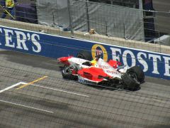 Ralf Schumacher sitting in his wrecked Toyota TF105
